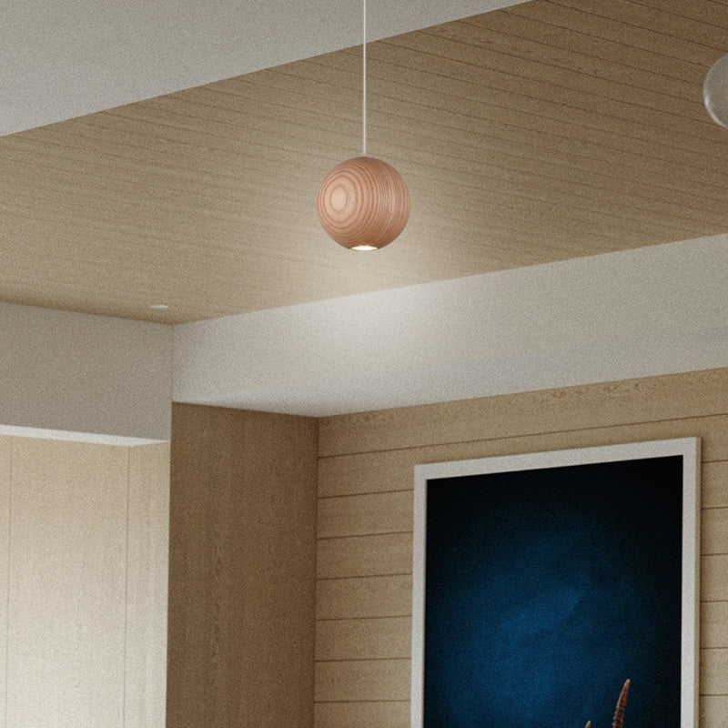 Simple wooden chandelier at the entrance